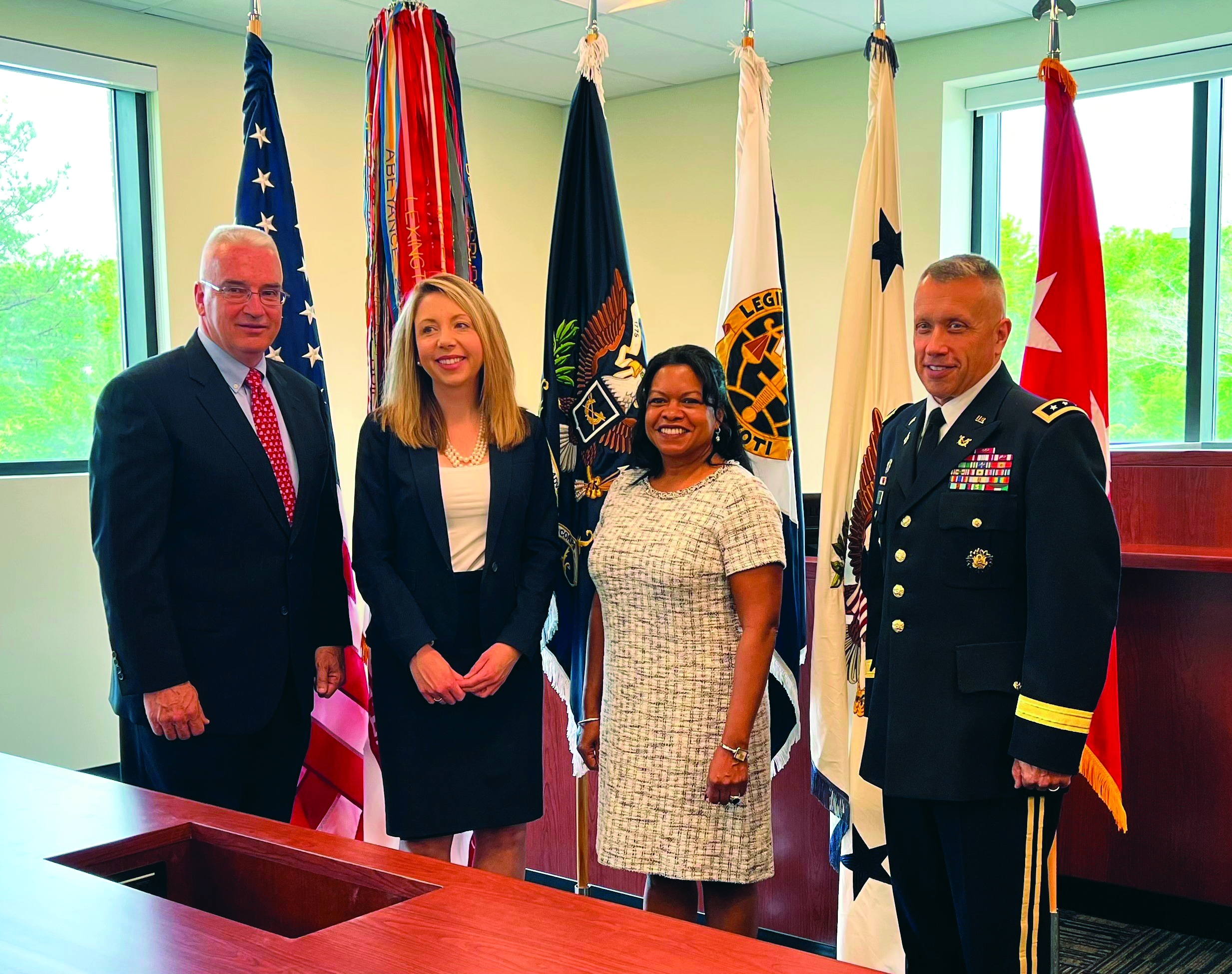 VIPs at the Advocacy Center opening on 5 May. Left
        to right are: Mr. Mike Mulligan, Director, Advocacy
        Center; Ms. Jessica D. Aber, U.S. Attorney for the
        Eastern District of Virginia; Ms. Carrie F. Ricci,
        Department of the Army General Counsel; Lieutenant
        General Stuart W. Risch, The Judge Advocate General.